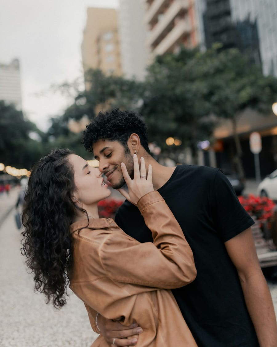A woman and her companion enjoying time together in a city setting.